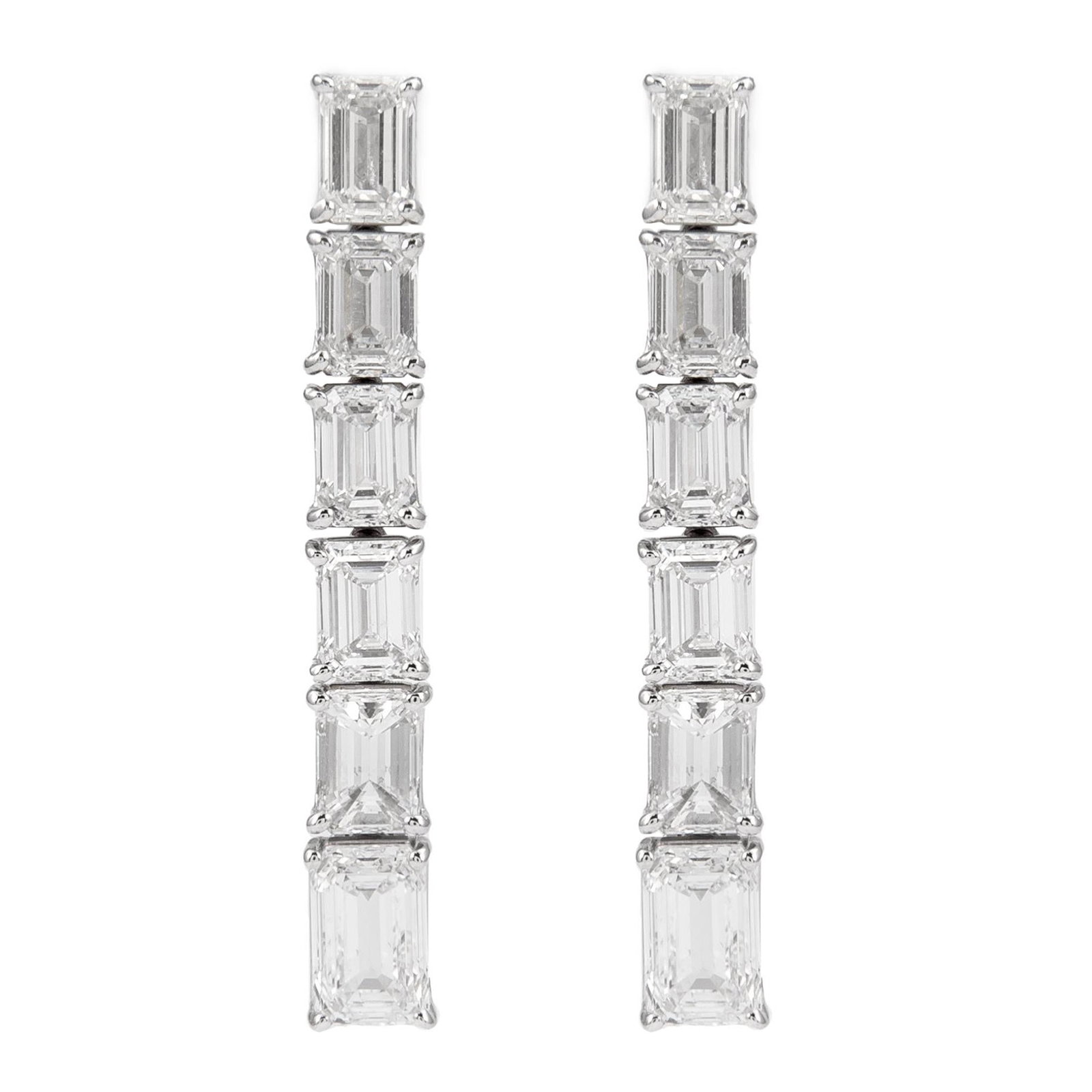 Emerald Cut Diamond Drop Earrings 5.33ct 18k White Gold: Emerald Cut Diamond Drop Earrings 5.33ct 18k White Gold Pair of un-used diamond drop earrings set in 18k white gold, featuring emerald cut diamonds with a total diamond weight of 5.33 ct. The design i