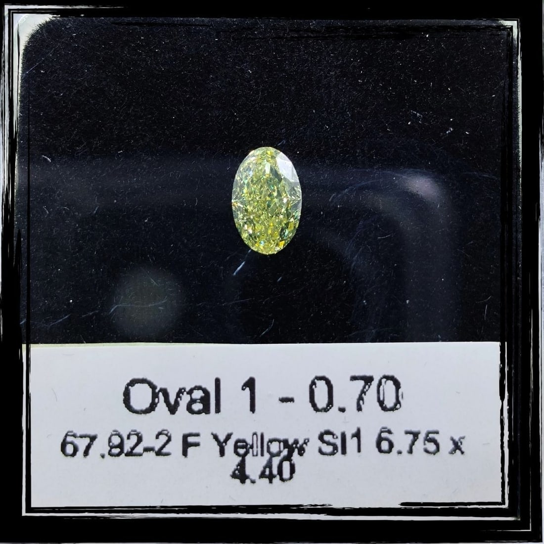 Loose Diamond - OVAL 0.7ct Faint Yellowish White SI1: Loose Diamond - OVAL 0.7ct Faint Yellowish White SI1 Source: Natural Shape: OVAL Carats: 0.7 Color: Faint Yellowish White Certification: NONE Video: