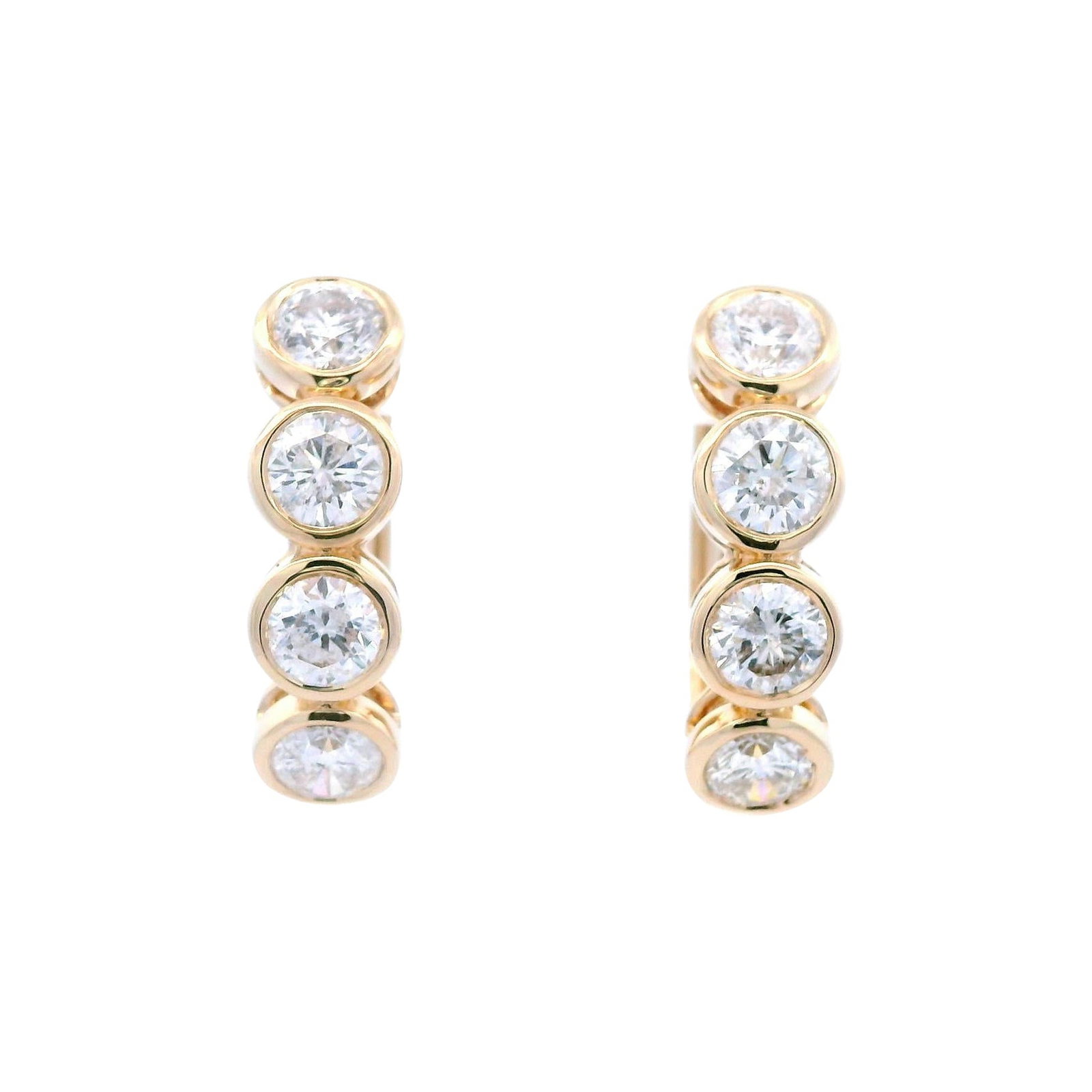14k Yellow Gold Diamond Hoop Earrings 2.58ct: 14k Yellow Gold Diamond Hoop Earrings 2.58ct A pair of contemporary bezel set hoop earrings in 14k yellow gold, featuring 8 natural round brilliant cut white diamonds with a total weight of 2.58 ct. M