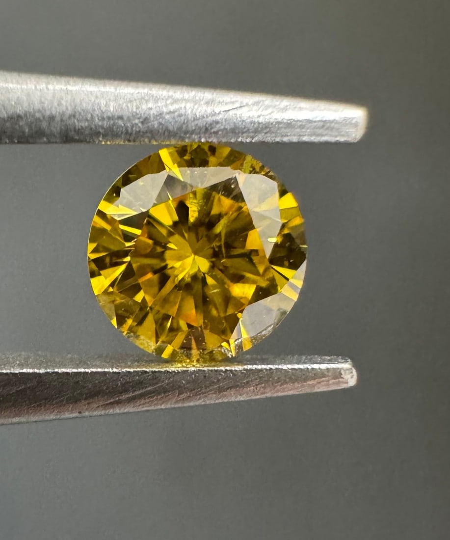 Loose Diamond - ROUND 0.23ct Fancy Vivid Yellow I1: Loose Diamond - ROUND 0.23ct Fancy Vivid Yellow I1 Source: Natural Shape: ROUND Carats: 0.23 Color: Fancy Vivid Yellow Certification: GIA PLEASE NOTE: Framed, Large, or heavy items do not have shippin