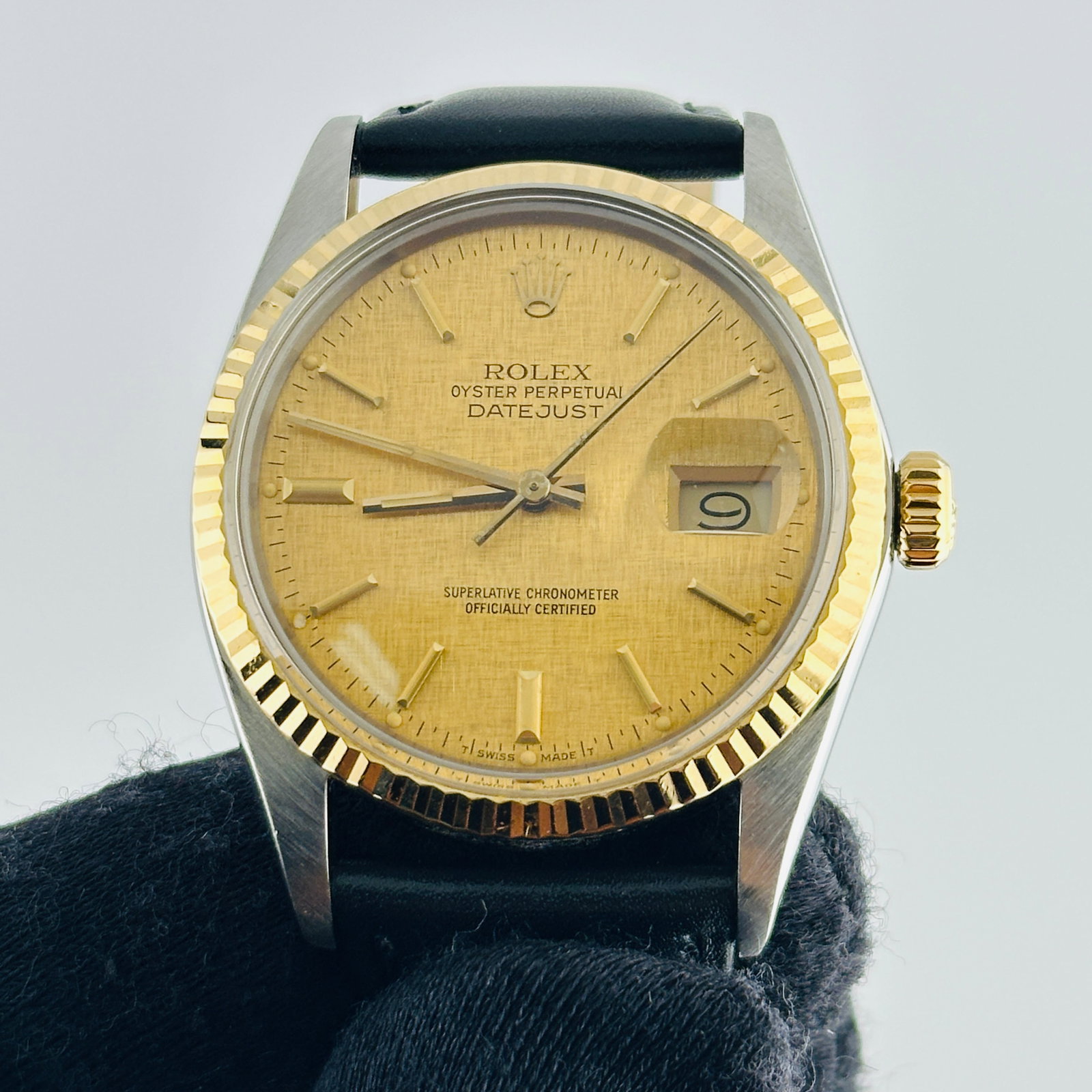 Rolex Datejust Ref 16013 Mens Watch Champagne Linen Dial Leather Strap: Rolex Datejust Ref 16013 Mens Watch Champagne Linen Dial Leather Strap Rolex Datejust reference 16013 with a champagne linen stick dial, fluted bezel, and generic leather band. This men's watch is ide