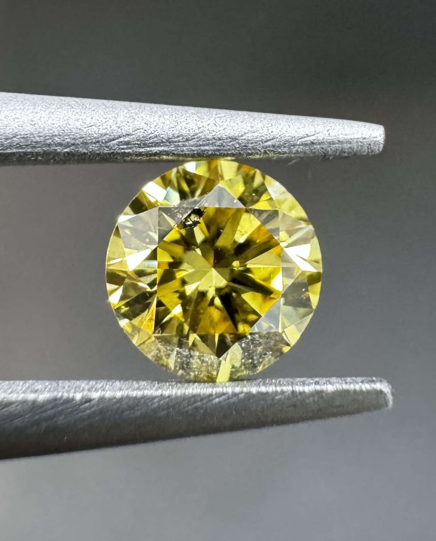 Loose Diamond - ROUND 0.22ct Fancy Intense Yellow I1: Loose Diamond - ROUND 0.22ct Fancy Intense Yellow I1 Source: Natural Shape: ROUND Carats: 0.22 Color: Fancy Intense Yellow Certification: GIA Video: