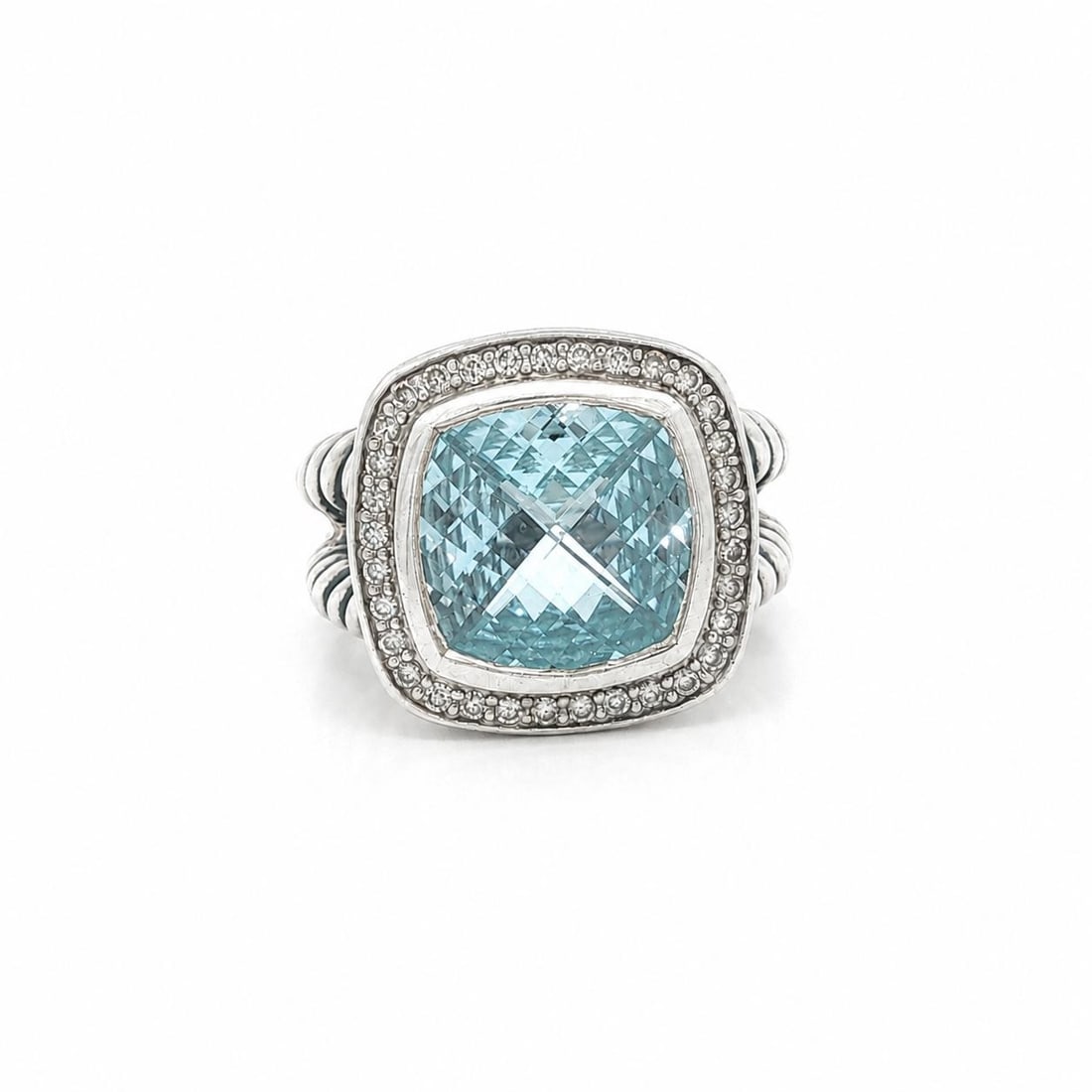 David Yurman Albion Ring Sterling Silver Blue Topaz Diamond Halo Size 6: David Yurman Albion Ring Sterling Silver Blue Topaz Diamond Halo Size 6 David Yurman Albion cocktail ring featuring a natural cushion checkerboard-cut blue topaz framed by a diamond halo. Crafted in s