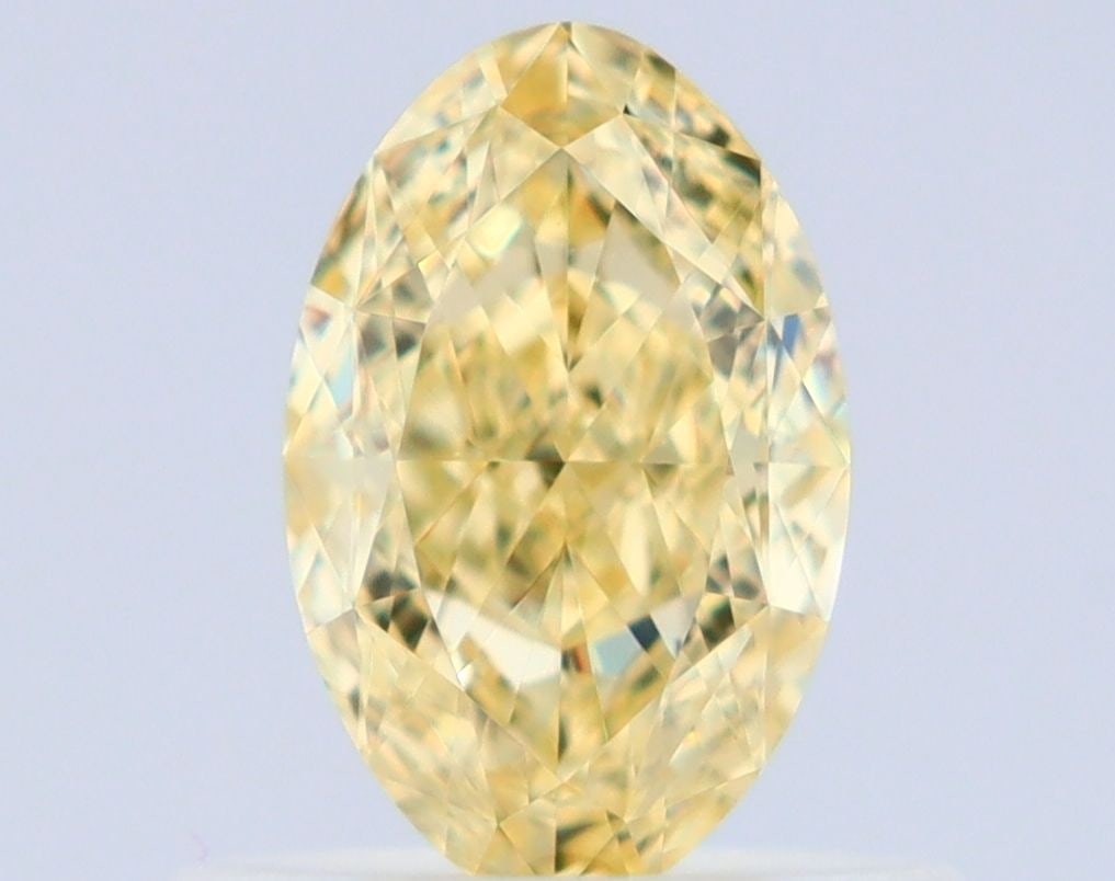 Loose Diamond - OVAL 0.6ct Fancy Yellow VVS2: Loose Diamond - OVAL 0.6ct Fancy Yellow VVS2 Source: Natural Shape: OVAL Carats: 0.6 Color: Fancy Yellow Certification: GIA Video: