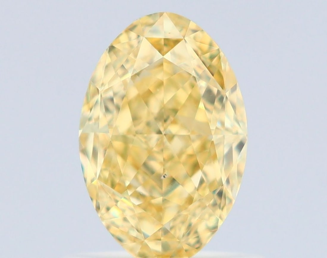 Loose Diamond - OVAL 1.01ct Fancy Yellow VS2: Loose Diamond - OVAL 1.01ct Fancy Yellow VS2 Source: Natural Shape: OVAL Carats: 1.01 Color: Fancy Yellow Certification: GIA Video: