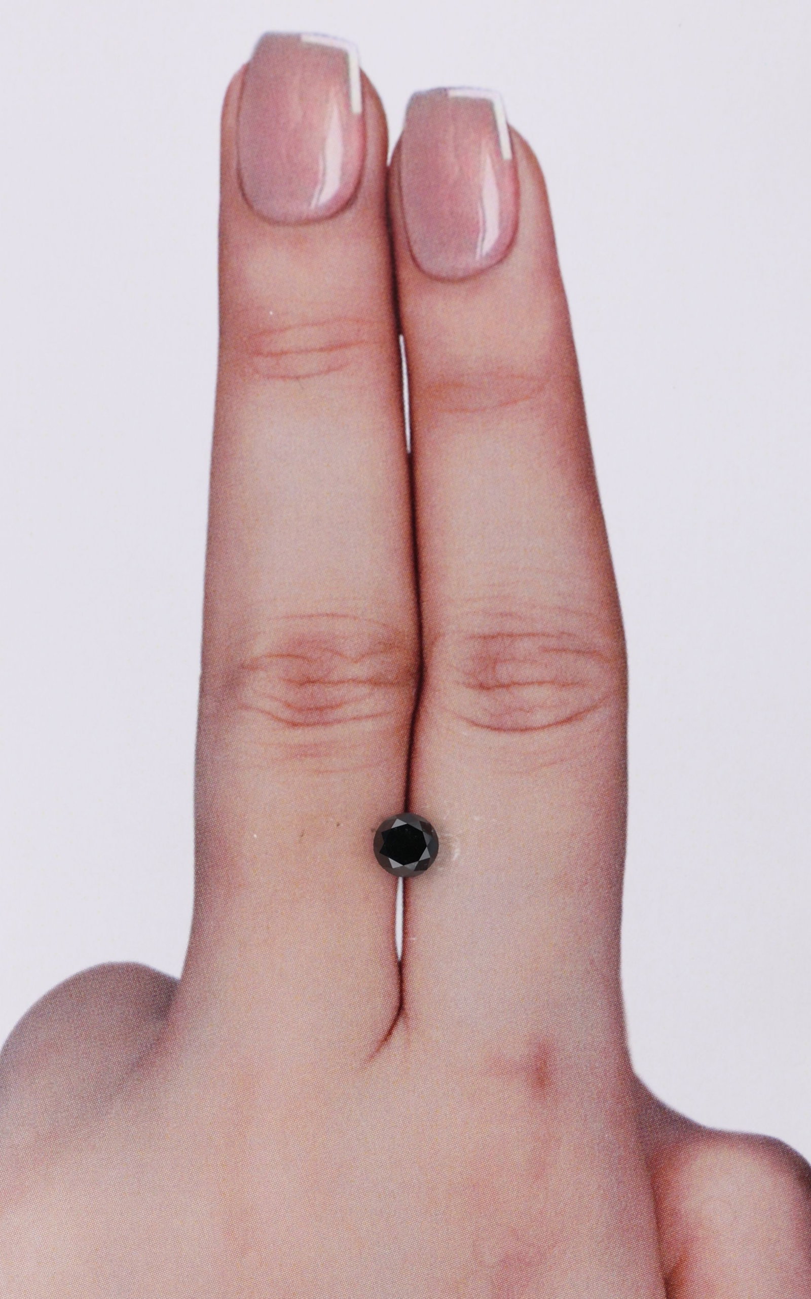 Loose Diamond - ROUND 0.47ct Black: Loose Diamond - ROUND 0.47ct Black Source: Natural Shape: ROUND Carats: 0.47 Color: Black Certification: IGI Video: Video Link PLEASE NOTE: Framed, Large, or heavy items do not have shipping costs