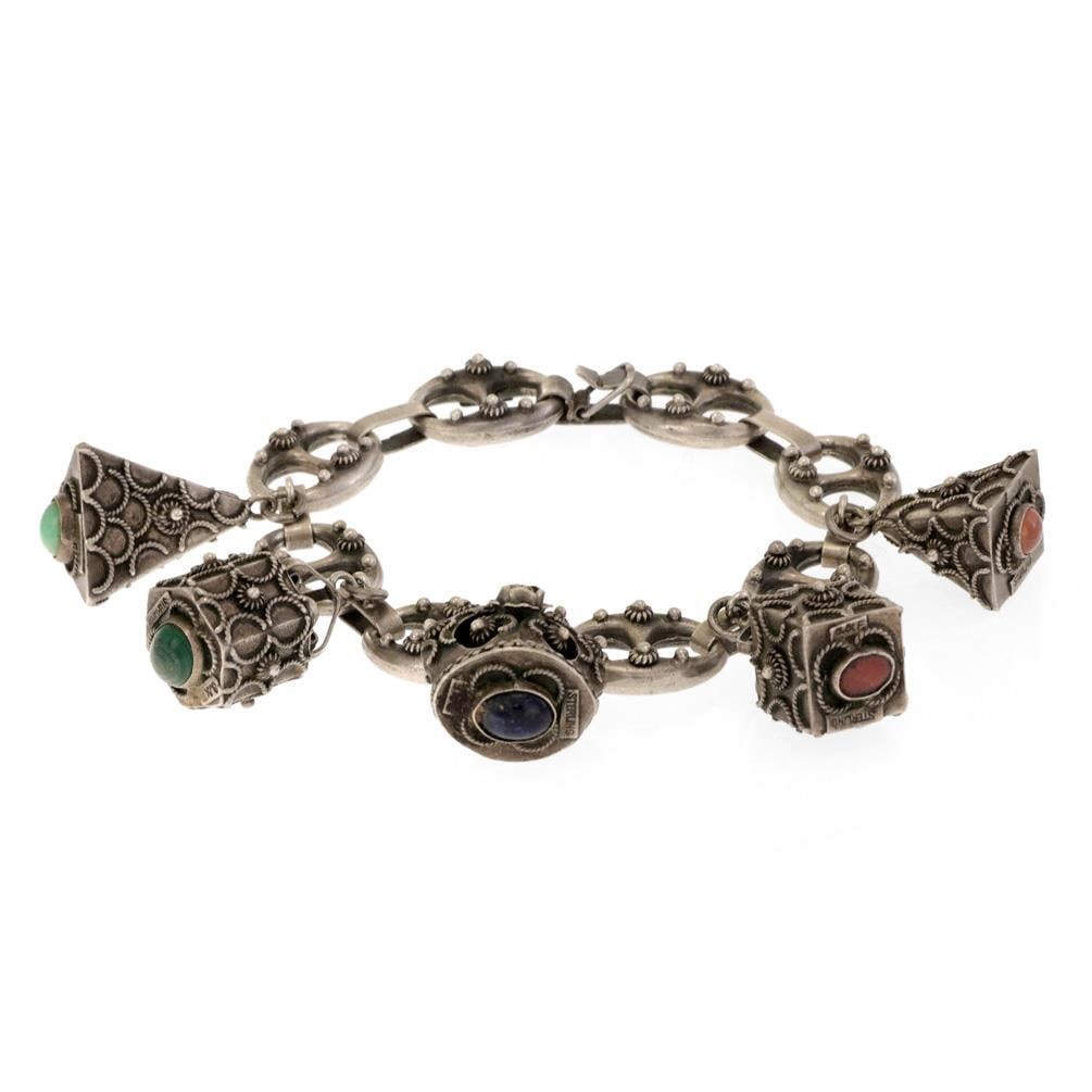 Vintage S&F Sterling Silver Mariner Link Bracelet with 5 Gem Charms: Vintage S&F Sterling Silver Mariner Link Bracelet with 5 Gem Charms This exquisite vintage bracelet showcases an intricate design featuring large mariner links, each embellished with Etruscan patterns