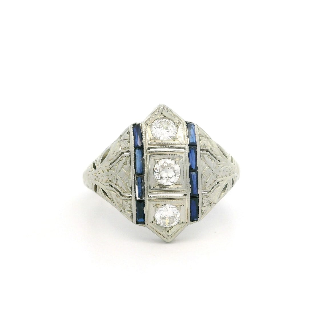 Antique Art Deco 18k White Gold Diamond Sapphire Cocktail Ring: Antique Art Deco 18k White Gold Diamond Sapphire Cocktail Ring This exquisite Antique Art Deco ring showcases a stunning design crafted from solid 18k white gold. The ring features three natural old E