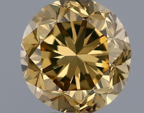 Loose Diamond - ROUND 0.31ct Fancy Brown Yellow: Loose Diamond - ROUND 0.31ct Fancy Brown Yellow Source: Natural Shape: ROUND Carats: 0.31 Color: Fancy Brown Yellow Certification: GIA Video: