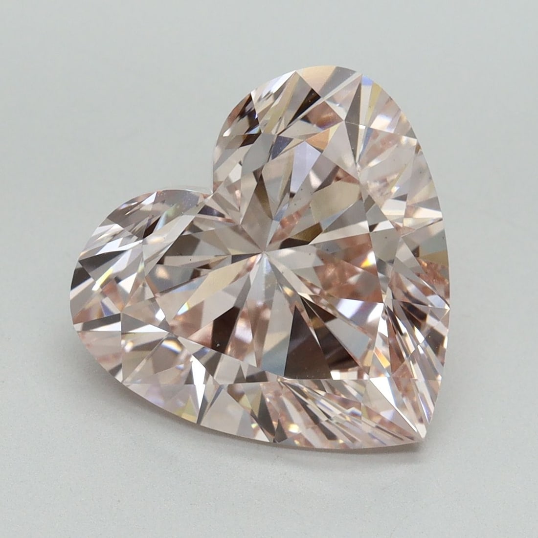Loose Diamond - HEART 5.67ct Fancy Light Pink VS1: Loose Diamond - HEART 5.67ct Fancy Light Pink VS1 Source: This is a real non-mined Diamond that has been grown in a lab Shape: HEART Carats: 5.67 Color: Fancy Light Pink Certification: IGI Video:
