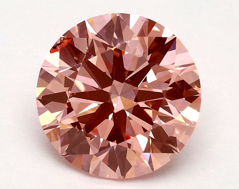 Ideal Loose Diamond - ROUND 2.2ct Fancy Vivid Pink SI1: Ideal Loose Diamond - ROUND 2.2ct Fancy Vivid Pink SI1 Source: This is a real non-mined Diamond that has been grown in a lab Shape: ROUND Carats: 2.2 Color: Fancy Vivid Pink Certification: IGI Video: