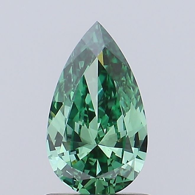 Loose Diamond - PEAR 0.81ct Fancy Vivid Green VVS2: Loose Diamond - PEAR 0.81ct Fancy Vivid Green VVS2 Source: This is a real non-mined Diamond that has been grown in a lab Shape: PEAR Carats: 0.81 Color: Fancy Vivid Green Certification: IGI Video: