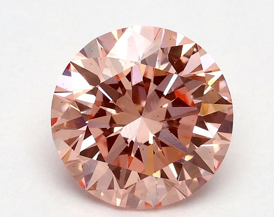 Loose Diamond - ROUND 1.7ct Fancy Vivid Pink VS1: Loose Diamond - ROUND 1.7ct Fancy Vivid Pink VS1 Source: This is a real non-mined Diamond that has been grown in a lab Shape: ROUND Carats: 1.7 Color: Fancy Vivid Pink Certification: IGI Video:
