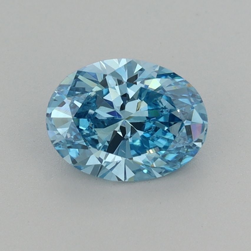 Loose Diamond - OVAL 0.94ct Fancy Vivid Blue VS2: Loose Diamond - OVAL 0.94ct Fancy Vivid Blue VS2 Source: This is a real non-mined Diamond that has been grown in a lab Shape: OVAL Carats: 0.94 Color: Fancy Vivid Blue Certification: IGI Video: