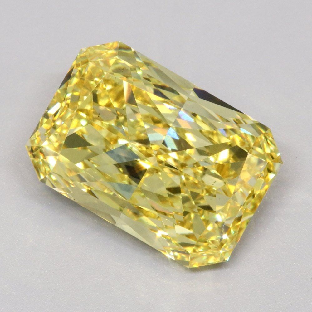 Loose Diamond - RADIANT 6.01ct Fancy Vivid Yellow VS1: Loose Diamond - RADIANT 6.01ct Fancy Vivid Yellow VS1 Source: This is a real non-mined Diamond that has been grown in a lab Shape: RADIANT Carats: 6.01 Color: Fancy Vivid Yellow Certification: IGI