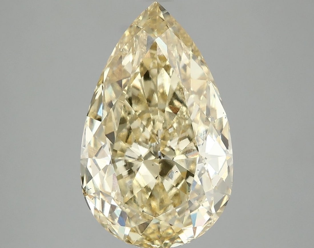 Loose Diamond - PEAR 5.05ct Fancy Vivid Yellow VS2: Loose Diamond - PEAR 5.05ct Fancy Vivid Yellow VS2 Source: This is a real non-mined Diamond that has been grown in a lab Shape: PEAR Carats: 5.05 Color: Fancy Vivid Yellow Certification: IGI Video: