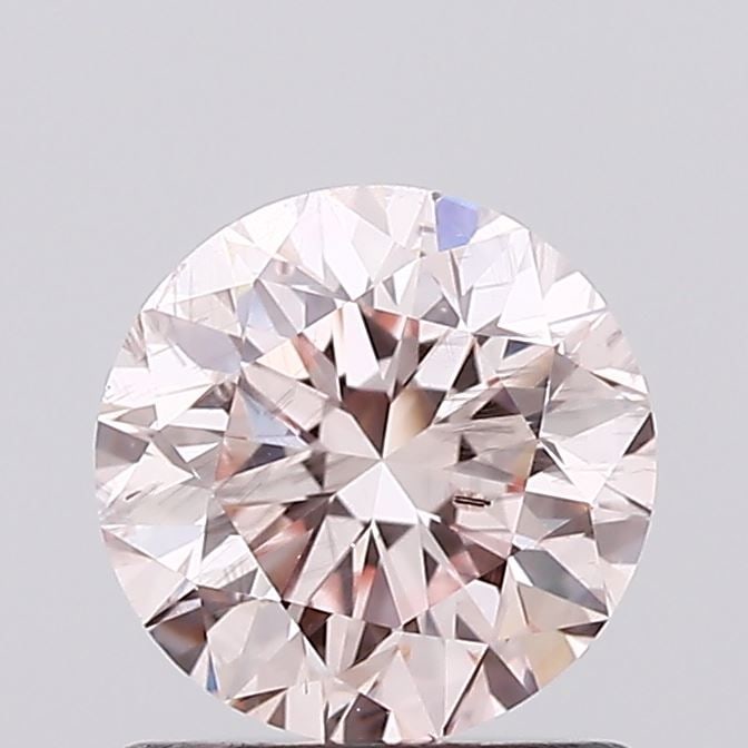 Loose Diamond - ROUND 0.91ct Fancy Light Pink SI2: Loose Diamond - ROUND 0.91ct Fancy Light Pink SI2 Source: This is a real non-mined Diamond that has been grown in a lab Shape: ROUND Carats: 0.91 Color: Fancy Light Pink Certification: IGI Video: