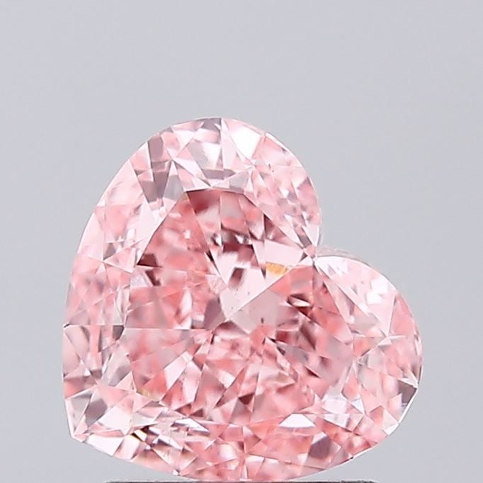 Loose Diamond - HEART 1.55ct Fancy Vivid Pink VS2: Loose Diamond - HEART 1.55ct Fancy Vivid Pink VS2 Source: This is a real non-mined Diamond that has been grown in a lab Shape: HEART Carats: 1.55 Color: Fancy Vivid Pink Certification: IGI PLEASE NOTE
