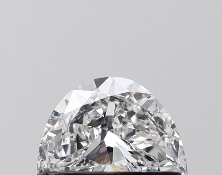 Loose Diamond - HALF MOON 0.6ct D VVS2: Loose Diamond - HALF MOON 0.6ct D VVS2 Source: This is a real non-mined Diamond that has been grown in a lab Shape: HALF MOON Carats: 0.6 Color: D Clarity: VVS2 Certification: IGI Video: