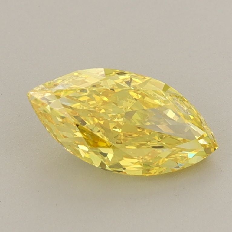 Loose Diamond - MARQUISE 1.04ct Fancy Vivid Yellow VS1: Loose Diamond - MARQUISE 1.04ct Fancy Vivid Yellow VS1 Source: This is a real non-mined Diamond that has been grown in a lab Shape: MARQUISE Carats: 1.04 Color: Fancy Vivid Yellow Certification: IGI