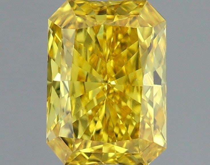 Loose Diamond - RADIANT 1.02ct Fancy Vivid Yellow VS2: Loose Diamond - RADIANT 1.02ct Fancy Vivid Yellow VS2 Source: This is a real non-mined Diamond that has been grown in a lab Shape: RADIANT Carats: 1.02 Color: Fancy Vivid Yellow Certification: IGI PLE