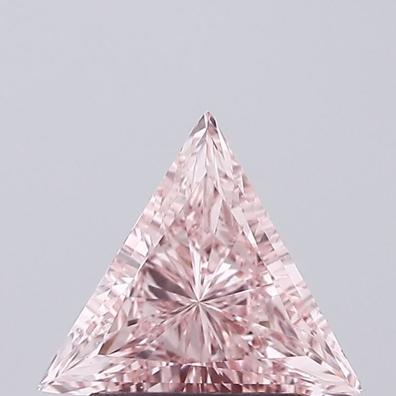 Loose Diamond - TRIANGULAR 0.79ct Fancy Intense Pink VVS2: Loose Diamond - TRIANGULAR 0.79ct Fancy Intense Pink VVS2 Source: This is a real non-mined Diamond that has been grown in a lab Shape: TRIANGULAR Carats: 0.79 Color: Fancy Intense Pink Certification: 
