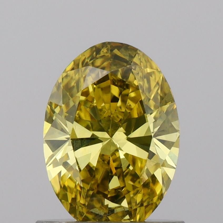Loose Diamond - OVAL 0.87ct Fancy Vivid Yellow VS1: Loose Diamond - OVAL 0.87ct Fancy Vivid Yellow VS1 Source: This is a real non-mined Diamond that has been grown in a lab Shape: OVAL Carats: 0.87 Color: Fancy Vivid Yellow Certification: IGI Video: