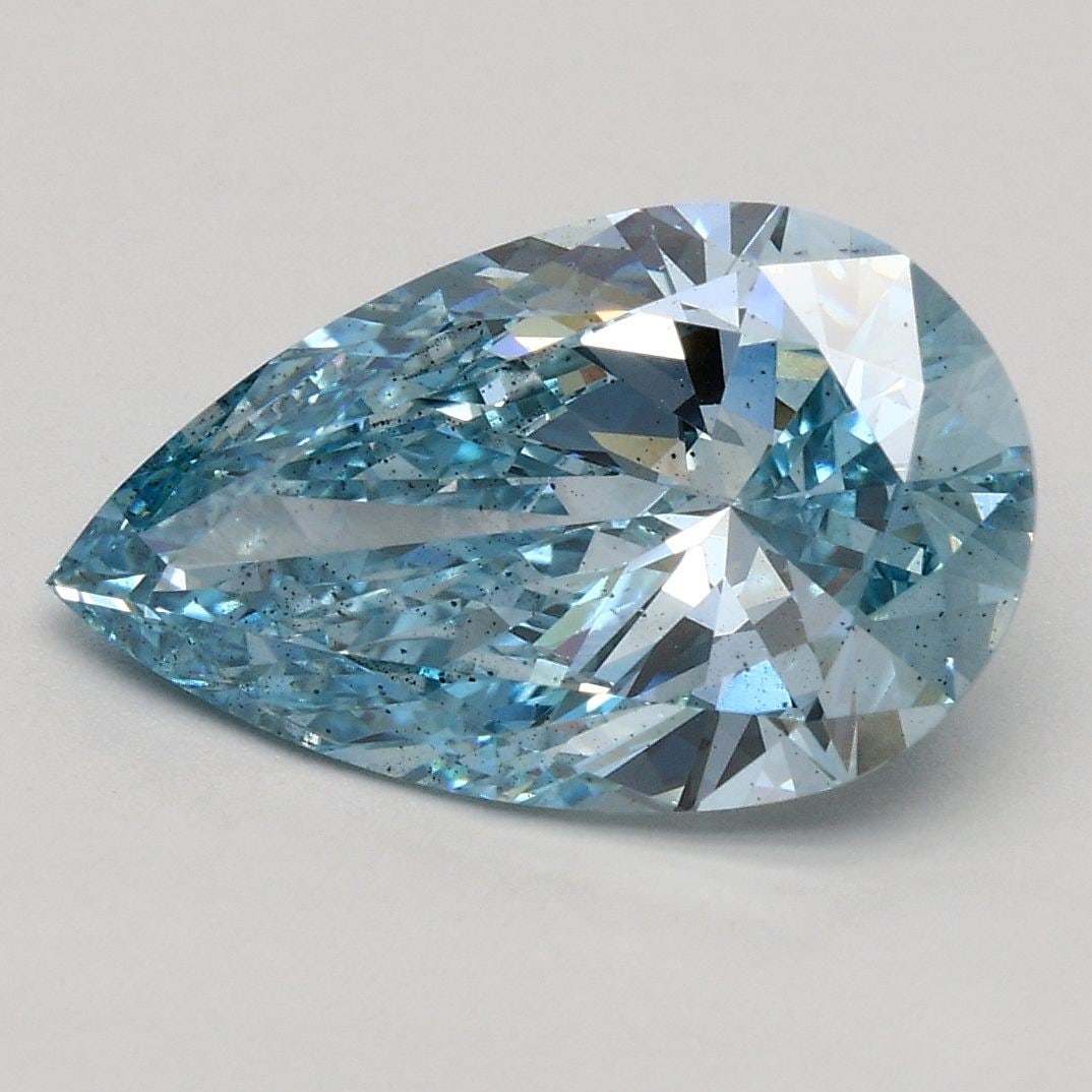 Loose Diamond - PEAR 2.12ct Fancy Vivid Blue SI1: Loose Diamond - PEAR 2.12ct Fancy Vivid Blue SI1 Source: This is a real non-mined Diamond that has been grown in a lab Shape: PEAR Carats: 2.12 Color: Fancy Vivid Blue Certification: IGI Video: Video