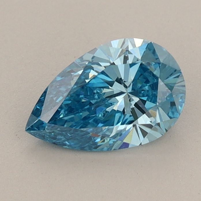 Loose Diamond - PEAR 0.8ct Fancy Vivid Blue VS2: Loose Diamond - PEAR 0.8ct Fancy Vivid Blue VS2 Source: This is a real non-mined Diamond that has been grown in a lab Shape: PEAR Carats: 0.8 Color: Fancy Vivid Blue Certification: IGI Video: