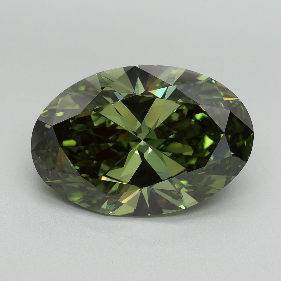 Loose Diamond - OVAL 8.2ct Fancy Vivid Green VVS2: Loose Diamond - OVAL 8.2ct Fancy Vivid Green VVS2 Source: This is a real non-mined Diamond that has been grown in a lab Shape: OVAL Carats: 8.2 Color: Fancy Vivid Green Certification: IGI Video: