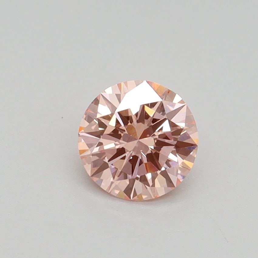 Loose Diamond - ROUND 0.54ct Fancy Intense Pink VS1: Loose Diamond - ROUND 0.54ct Fancy Intense Pink VS1 Source: This is a real non-mined Diamond that has been grown in a lab Shape: ROUND Carats: 0.54 Color: Fancy Intense Pink Certification: IGI Video: