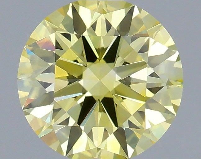Ideal Loose Diamond - ROUND 0.48ct Fancy Vivid Yellow VVS2: Ideal Loose Diamond - ROUND 0.48ct Fancy Vivid Yellow VVS2 Source: This is a real non-mined Diamond that has been grown in a lab Shape: ROUND Carats: 0.48 Color: Fancy Vivid Yellow Certification: IGI 