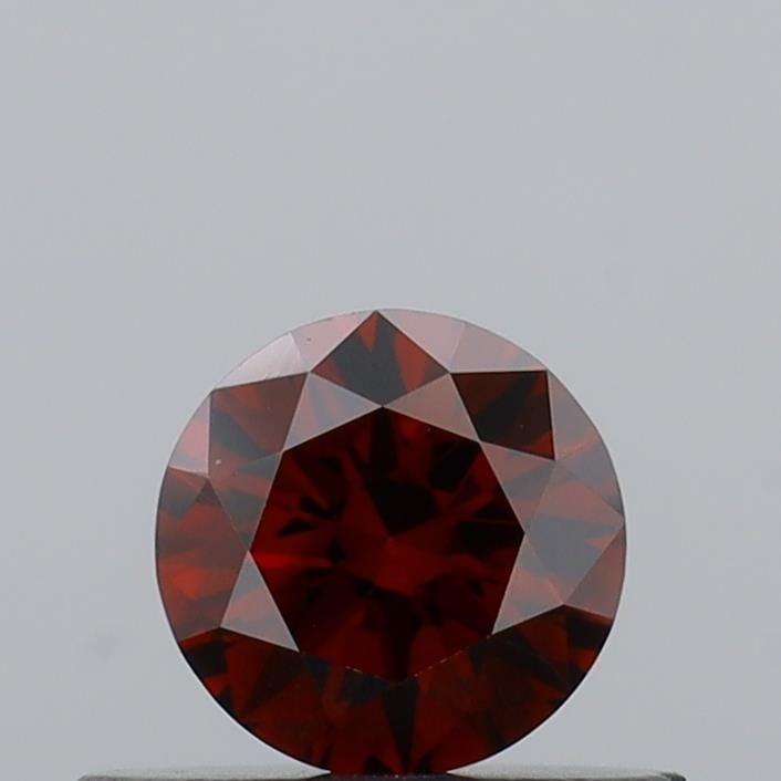 Loose Diamond - ROUND 0.35ct Fancy Vivid Orange VS2: Loose Diamond - ROUND 0.35ct Fancy Vivid Orange VS2 Source: This is a real non-mined Diamond that has been grown in a lab Shape: ROUND Carats: 0.35 Color: Fancy Vivid Orange Certification: IGI Video: