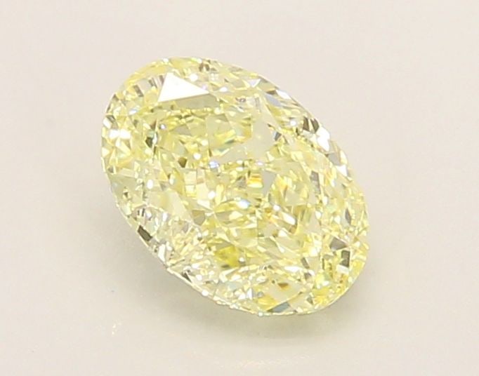 Loose Diamond - OVAL 1.04ct Fancy Yellow VVS2: Loose Diamond - OVAL 1.04ct Fancy Yellow VVS2 Source: This is a real non-mined Diamond that has been grown in a lab Shape: OVAL Carats: 1.04 Color: Fancy Yellow Certification: IGI Video: