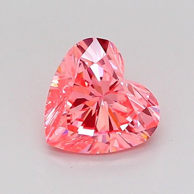 Loose Diamond - HEART 0.84ct Fancy Vivid Pink VS1: Loose Diamond - HEART 0.84ct Fancy Vivid Pink VS1 Source: This is a real non-mined Diamond that has been grown in a lab Shape: HEART Carats: 0.84 Color: Fancy Vivid Pink Certification: IGI Video: