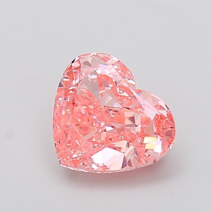Loose Diamond - HEART 3.03ct Fancy Vivid Pink VVS2: Loose Diamond - HEART 3.03ct Fancy Vivid Pink VVS2 Source: This is a real non-mined Diamond that has been grown in a lab Shape: HEART Carats: 3.03 Color: Fancy Vivid Pink Certification: IGI Video: