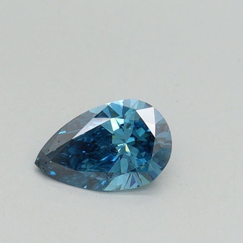 Loose Diamond - PEAR 0.32ct Fancy Vivid Blue VS1: Loose Diamond - PEAR 0.32ct Fancy Vivid Blue VS1 Source: This is a real non-mined Diamond that has been grown in a lab Shape: PEAR Carats: 0.32 Color: Fancy Vivid Blue Certification: IGI Video: