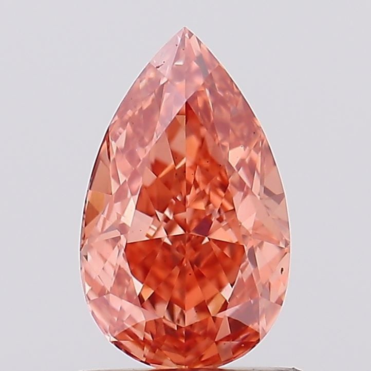 Loose Diamond - PEAR 1.04ct Fancy Vivid Brownish Pink VS1: Loose Diamond - PEAR 1.04ct Fancy Vivid Brownish Pink VS1 Source: This is a real non-mined Diamond that has been grown in a lab Shape: PEAR Carats: 1.04 Color: Fancy Vivid Brownish Pink Certification: