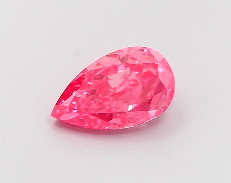 Loose Diamond - PEAR 1.29ct Fancy Vivid Pink VS1: Loose Diamond - PEAR 1.29ct Fancy Vivid Pink VS1 Source: This is a real non-mined Diamond that has been grown in a lab Shape: PEAR Carats: 1.29 Color: Fancy Vivid Pink Certification: IGI Video: Video