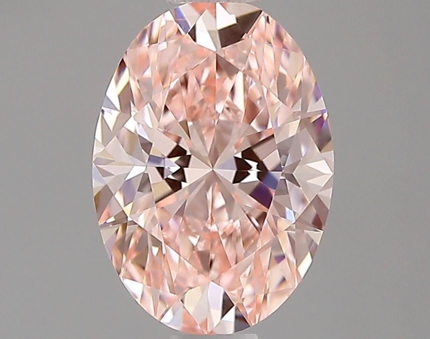 Loose Diamond - OVAL 0.71ct Fancy Intense Pink VVS1: Loose Diamond - OVAL 0.71ct Fancy Intense Pink VVS1 Source: This is a real non-mined Diamond that has been grown in a lab Shape: OVAL Carats: 0.71 Color: Fancy Intense Pink Certification: IGI Video: