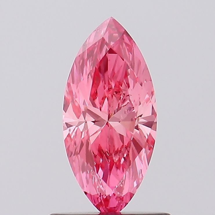 Loose Diamond - MARQUISE 0.72ct Fancy Vivid Pink VS2: Loose Diamond - MARQUISE 0.72ct Fancy Vivid Pink VS2 Source: This is a real non-mined Diamond that has been grown in a lab Shape: MARQUISE Carats: 0.72 Color: Fancy Vivid Pink Certification: IGI Video