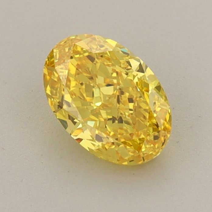 Loose Diamond - OVAL 0.84ct Fancy Vivid Yellow VVS2: Loose Diamond - OVAL 0.84ct Fancy Vivid Yellow VVS2 Source: This is a real non-mined Diamond that has been grown in a lab Shape: OVAL Carats: 0.84 Color: Fancy Vivid Yellow Certification: IGI Video: