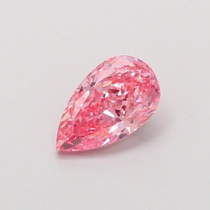 Loose Diamond - PEAR 0.62ct Fancy Vivid Pink VS2: Loose Diamond - PEAR 0.62ct Fancy Vivid Pink VS2 Source: This is a real non-mined Diamond that has been grown in a lab Shape: PEAR Carats: 0.62 Color: Fancy Vivid Pink Certification: IGI Video: