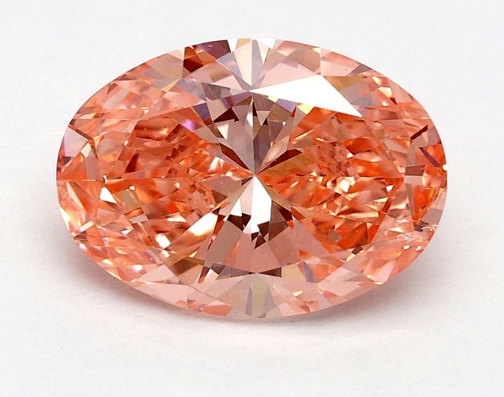 Loose Diamond - OVAL 1.7ct Fancy Vivid Pink VS2: Loose Diamond - OVAL 1.7ct Fancy Vivid Pink VS2 Source: This is a real non-mined Diamond that has been grown in a lab Shape: OVAL Carats: 1.7 Color: Fancy Vivid Pink Certification: IGI Video: