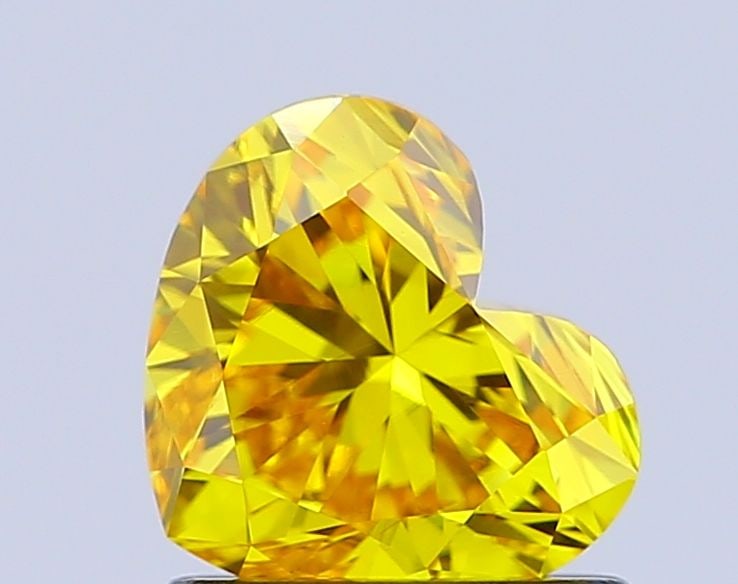 Loose Diamond - HEART 1.0ct Fancy Vivid Yellow VS1: Loose Diamond - HEART 1.0ct Fancy Vivid Yellow VS1 Source: This is a real non-mined Diamond that has been grown in a lab Shape: HEART Carats: 1.0 Color: Fancy Vivid Yellow Certification: IGI Video: