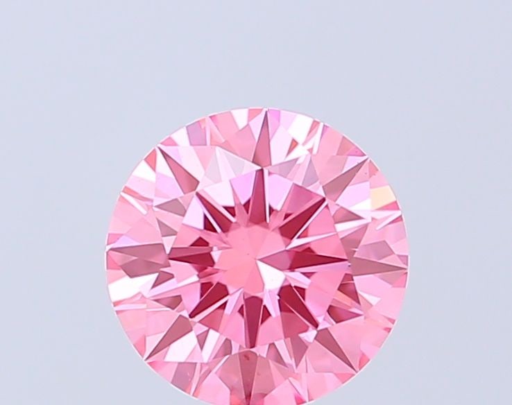 Ideal Loose Diamond - ROUND 1.02ct Fancy Vivid Pink VVS2: Ideal Loose Diamond - ROUND 1.02ct Fancy Vivid Pink VVS2 Source: This is a real non-mined Diamond that has been grown in a lab Shape: ROUND Carats: 1.02 Color: Fancy Vivid Pink Certification: IGI Vide