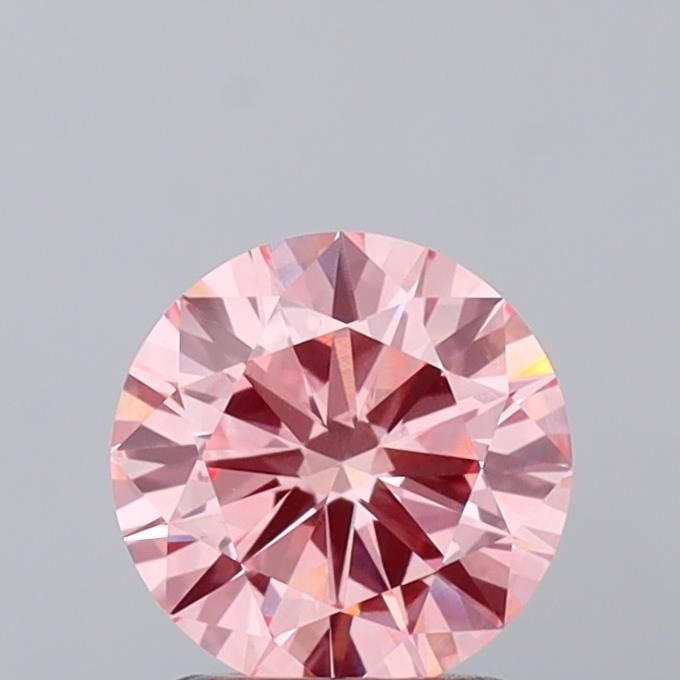 Loose Diamond - ROUND 1.48ct Fancy Vivid Pink VS1: Loose Diamond - ROUND 1.48ct Fancy Vivid Pink VS1 Source: This is a real non-mined Diamond that has been grown in a lab Shape: ROUND Carats: 1.48 Color: Fancy Vivid Pink Certification: IGI Video: