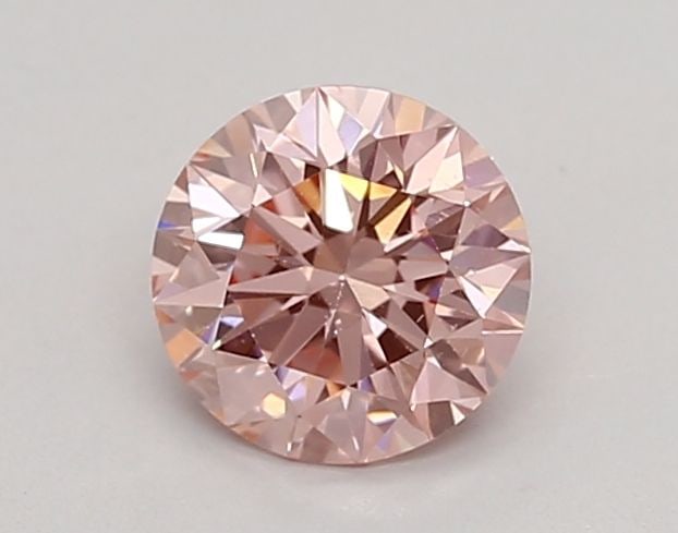 Loose Diamond - ROUND 0.65ct Fancy Intense Pink VS1: Loose Diamond - ROUND 0.65ct Fancy Intense Pink VS1 Source: This is a real non-mined Diamond that has been grown in a lab Shape: ROUND Carats: 0.65 Color: Fancy Intense Pink Certification: IGI Video: