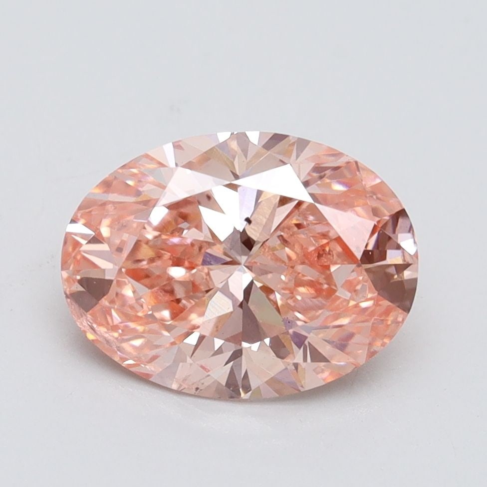 Loose Diamond - OVAL 2.01ct Fancy Vivid Pink SI2: Loose Diamond - OVAL 2.01ct Fancy Vivid Pink SI2 Source: This is a real non-mined Diamond that has been grown in a lab Shape: OVAL Carats: 2.01 Color: Fancy Vivid Pink Certification: IGI Video: