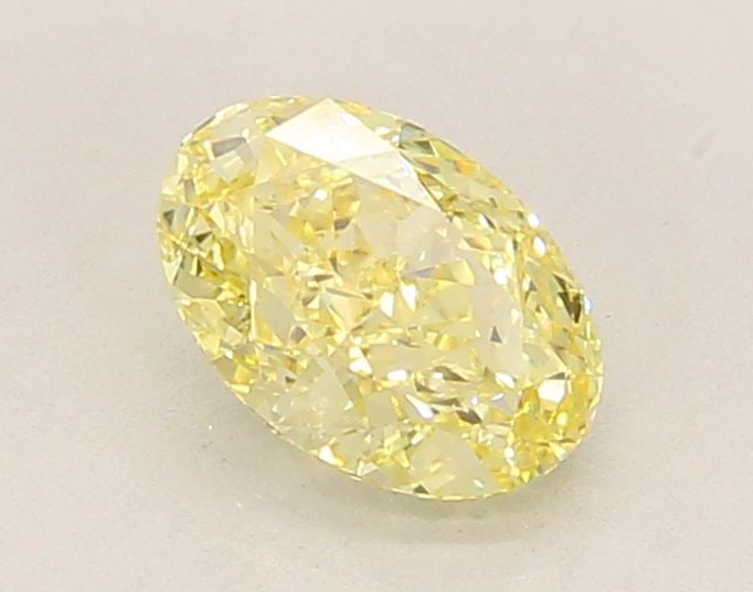 Loose Diamond - OVAL 1.08ct Fancy Yellow VVS2: Loose Diamond - OVAL 1.08ct Fancy Yellow VVS2 Source: This is a real non-mined Diamond that has been grown in a lab Shape: OVAL Carats: 1.08 Color: Fancy Yellow Certification: IGI Video: